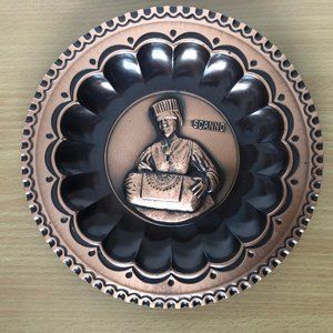 Vintage Italian metal copper plate man carrying a box Scanno